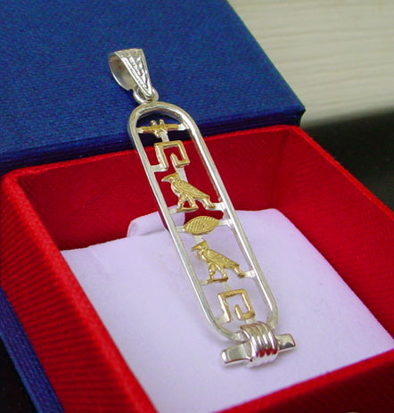 Egyptian pendants, & silver cartouche in 18k gold    